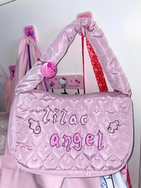 Image 3 of angel nurse bunny heart puffer bag