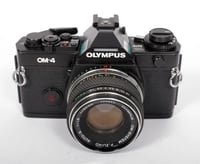 Image 1 of Share Olympus OM-4 35mm film SLR camera with 50mm F1.8 lens #1346