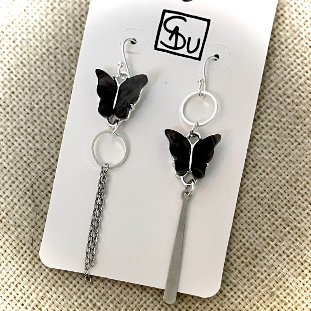 Image of BO asymétriques argentées Papillon