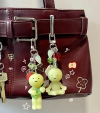 Image 1 of Smiski Apple Keychains