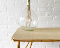 Image 4 of Table en rotin pieds évasés
