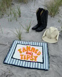 Tanned & Tipsy 