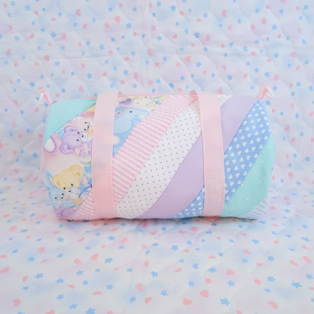 Quilted Round Duffle Bag: 01