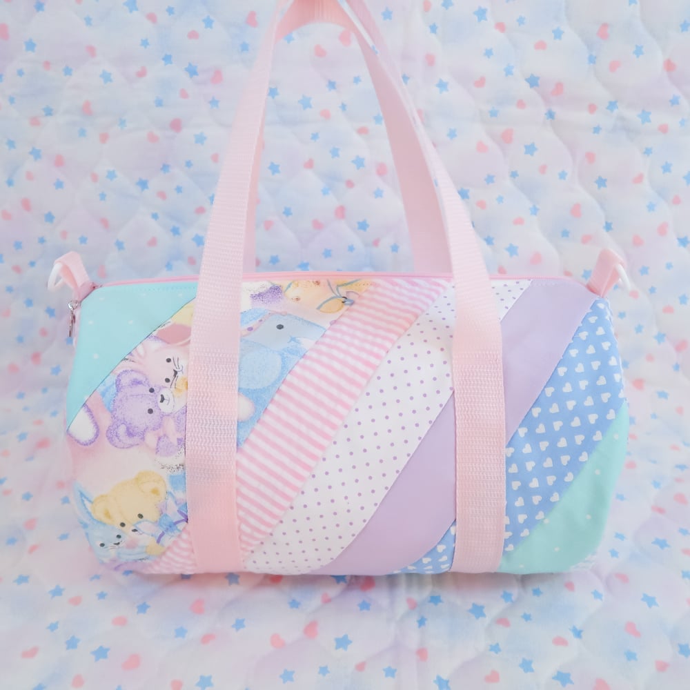 Quilted Round Duffle Bag: 01