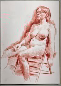 figure in orange ink