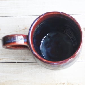 Image of Deep Red with Melting Blue and Gold Glazed Pottery Mug, 13 Ounce Handcrafted Coffee Cup, Made in USA