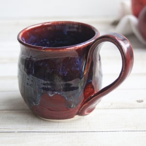 Image of Deep Red with Melting Blue and Gold Glazed Pottery Mug, 13 Ounce Handcrafted Coffee Cup, Made in USA