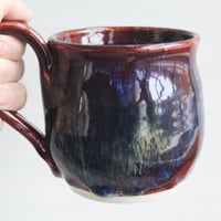 Image 6 of Deep Red with Melting Blue and Gold Glazed Pottery Mug, 13 Ounce Handcrafted Coffee Cup, Made in USA