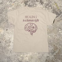 Image 1 of The Center Benefit Tee - Healing Is A Human Right- Natural