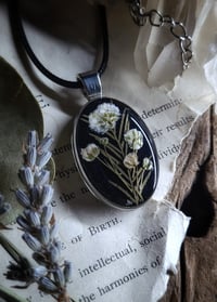 Image 2 of Double Sided Snake Spine and Floral Pendant