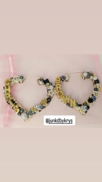Jumbo size Chris Brown earrings 