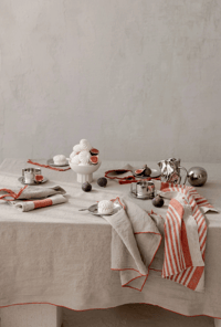 Image 2 of tablecloth - natural linen with a red edge