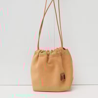 Image 1 of Scrunchy Suede Sling in muted butter