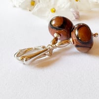 Image 1 of Black and Tan with Silver