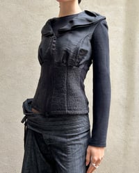 Image 1 of FITTED ZIP UP RUFFLE TOP