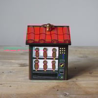 Image 2 of vending machine ornament (red/ kokeshi)