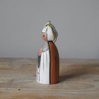 Image 3 of little saint decoration