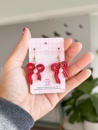 Image 3 of Holiday Coquette Bow Clay Earrings