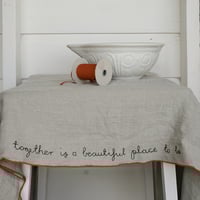 tablecloth - natural linen with a red edge + stitched words