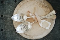 Image 1 of stamped serving spoon 