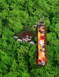 Image 1 of Worldforms Charm + Lanyard: Pride Lands