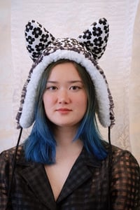 Image 2 of La Modiste: Quilted Black Floral Cat Hat w/ Black Frill Trim