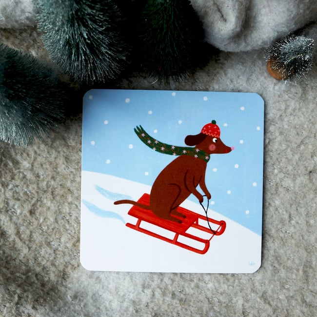 Collection de Noël 2025 : chien sur luge