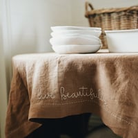 Image 1 of hand stitched tablecloth - hazelnut