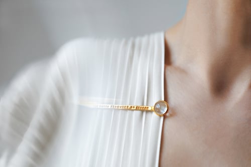 Image of "Rays of sun.." gold plated silver brooch with rock crystal  · RADII SOLIS.. ·