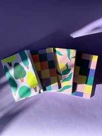 Image 1 of Lot de 4 petits carnets illustrés 