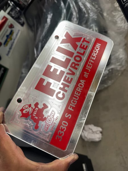 Image of CHROME & RED FELIX CHEVROLET ICONIC LICENSE PLATE