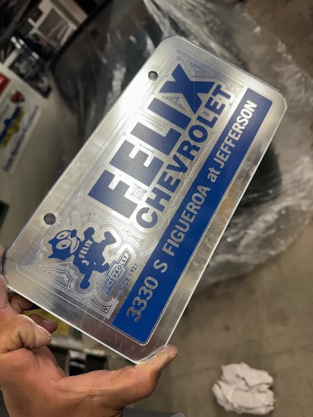 Image of CHROME & BLUE FELIX CHEVROLET ICONIC LICENSE PLATE