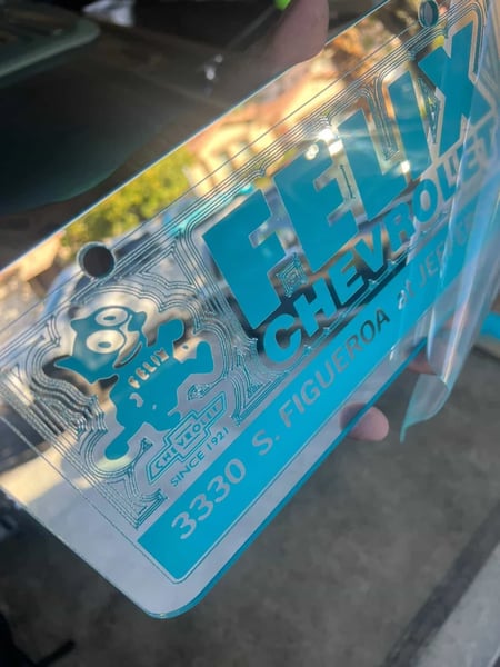 Image of CHROME & LIGHT BLUE FELIX CHEVROLET ICONIC LICENSE PLATE