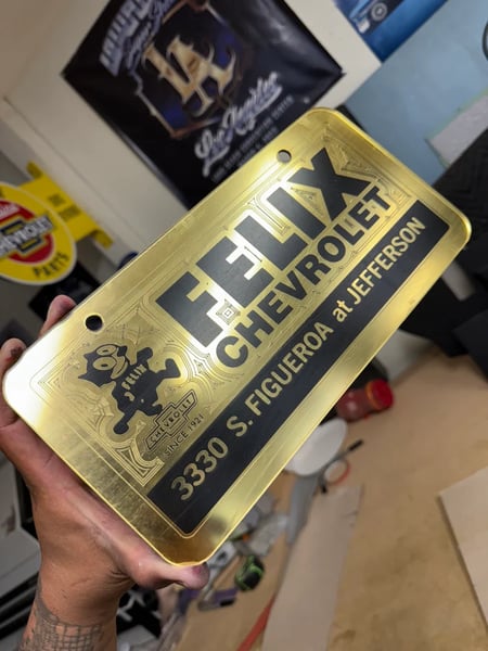 Image of GOLD & BLACK FELIX CHEVROLET ICONIC LICENSE PLATE