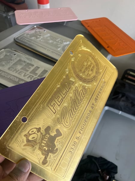 Image of ALL GOLD FELIX CADILLAC ICONIC LICENSE PLATE