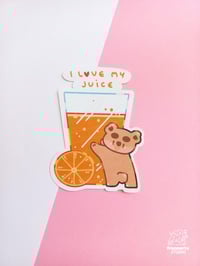 Image 1 of Adesivo Orso con Succo d'arancia
