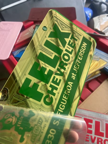 Image of GOLD & GREEN FELIX CHEVROLET ICINIC PLATE