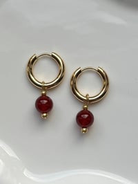 Image 1 of Carnelian Huggies Gold/Stainless Steel