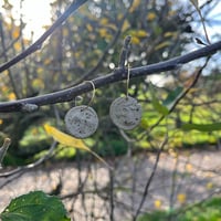Image 2 of Coin earrings - buff iron speckle, gold plated hoops
