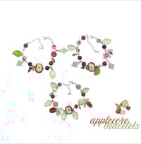 Image 1 of apple charm bracelet
