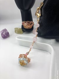 Image 1 of Dangling Rose Quartz rosary chain dangling Mini Basket infused with aquamarine CHARM 