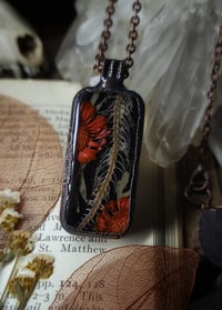 Image 2 of Ribcage and Floral Pendant