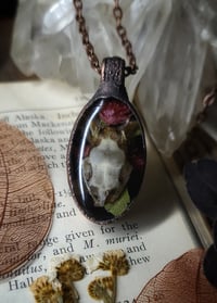 Image 1 of Snake Skull and Floral Pendant