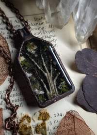 Image 1 of Lizard Claw and Floral Pendant