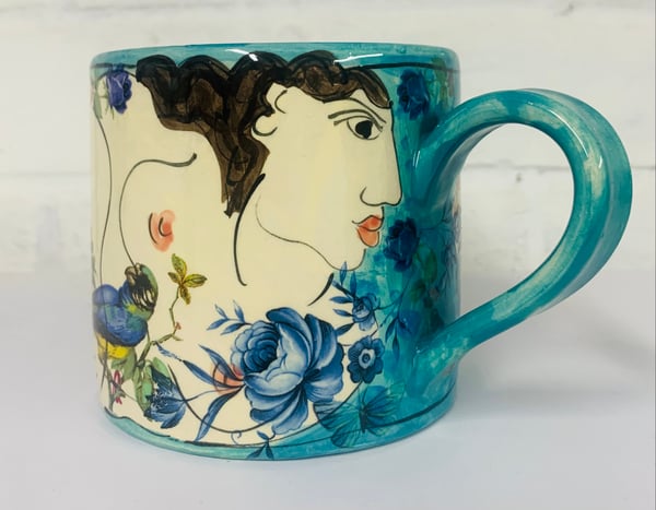 Image of Teal green figurative cylinder mug