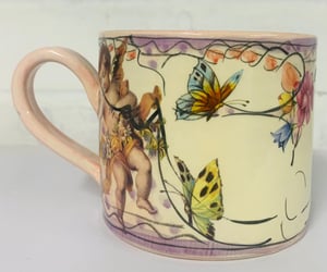Image of Light pink figurative cylinder mug