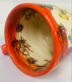 Image of Red cylinder figurative mug