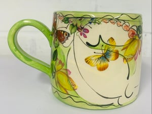 Image of Lime green cylinder figurative mug