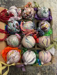 Image 1 of Box of 12 small hand marbled ceramic baubles with vintage style silky ribbons.