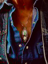 Image 1 of Montezuma Royston Turquoise Buffalo Skull Pendant